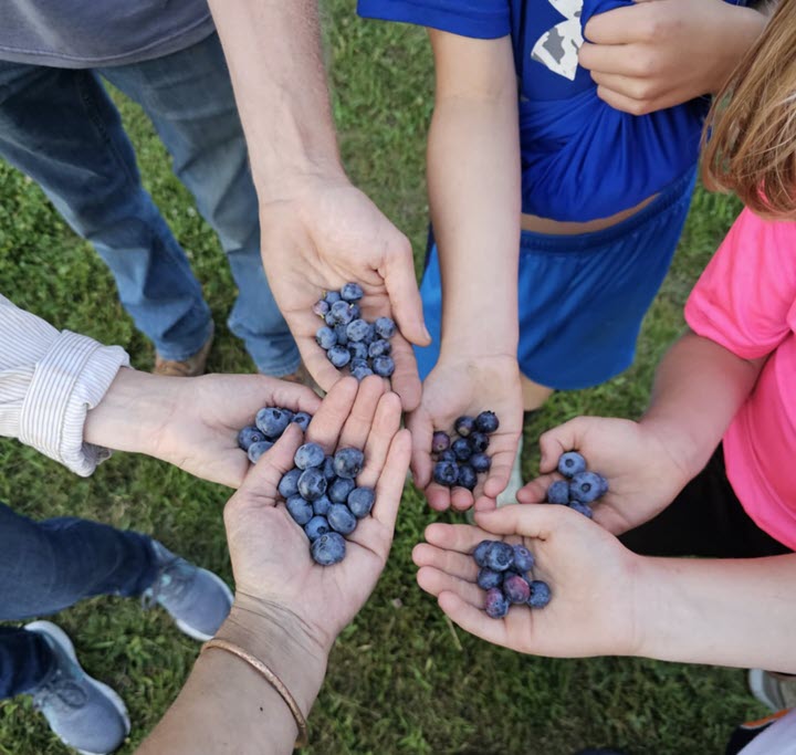 Two boys by the Northridge sign